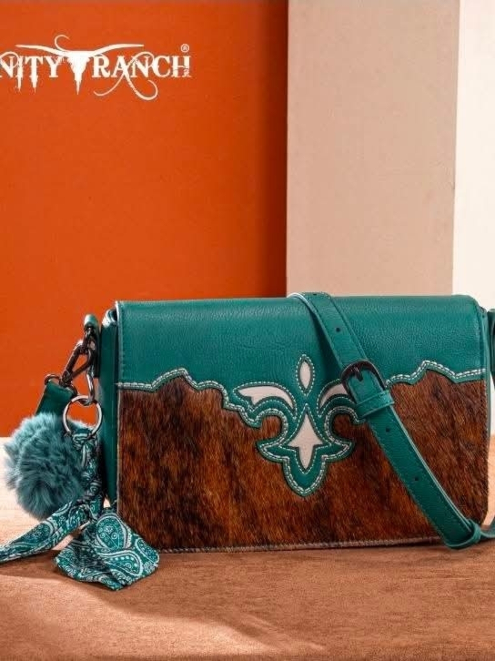 Trinity Ranch Teal and Brown Haircalf Crossbody Bag with Tassel Charm